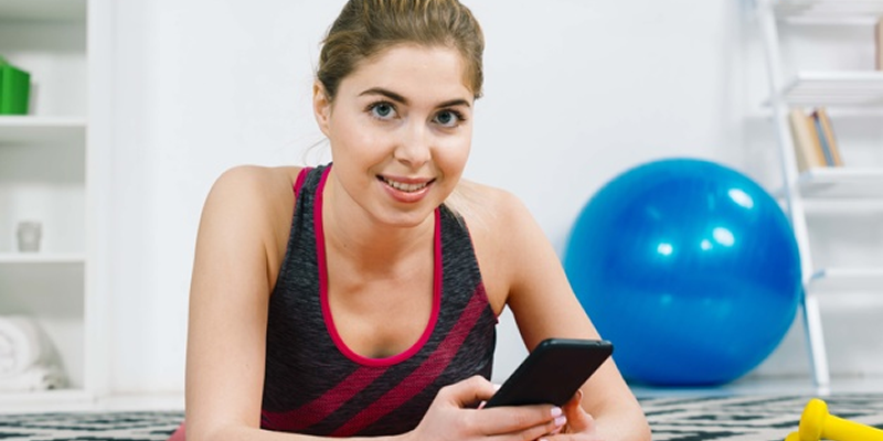 fitness woman with mobile phone